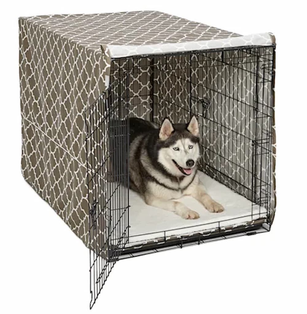 https://www.vetstreet.com/wp-content/uploads/2023/05/Midwest-Quiet-Time-Defender-Brown-Crate-Cover-for-Dogs-1.jpg