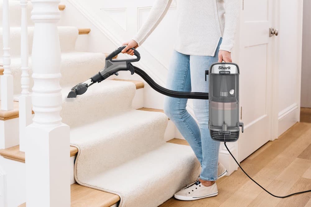 Shark vacuum in action on the stairs