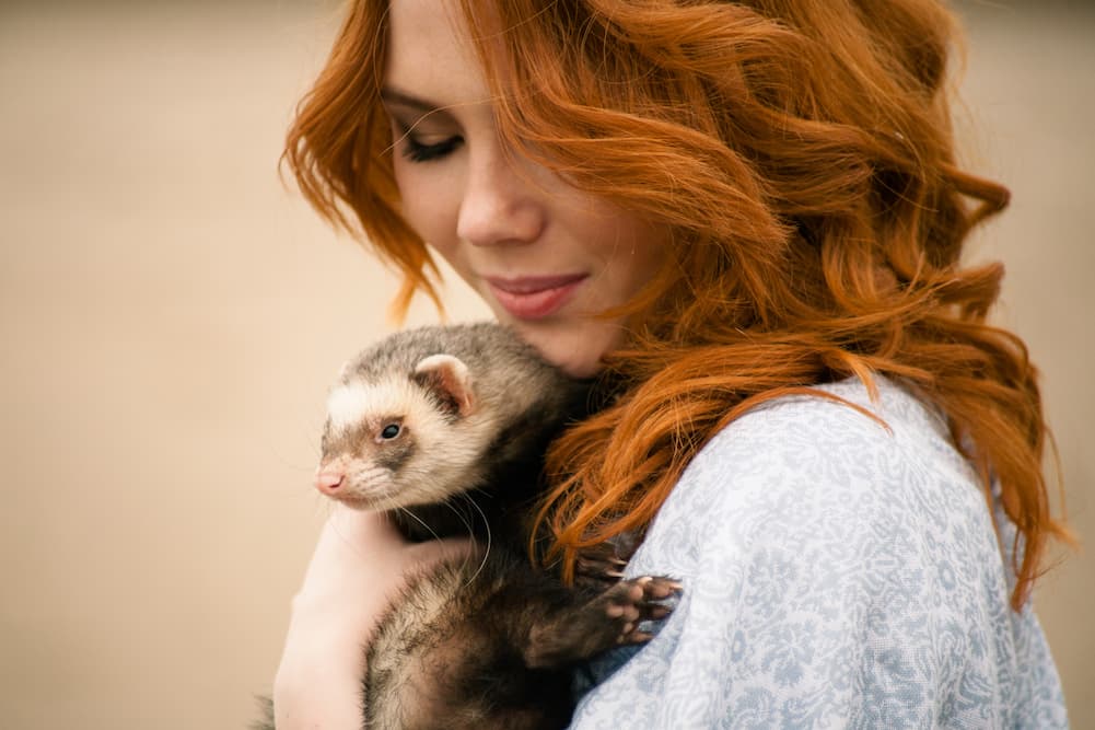 woman with a ferret